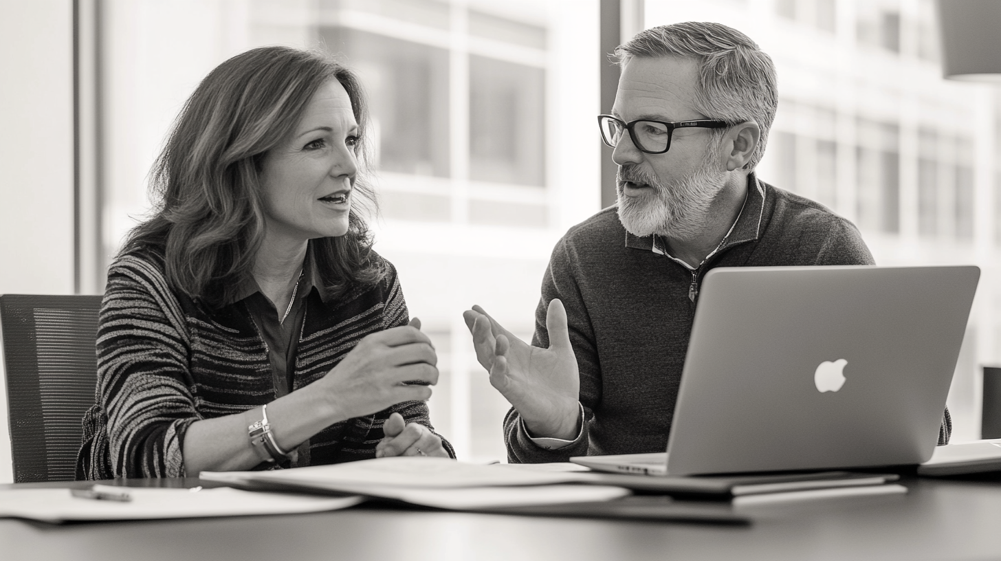 Two executives in strategic discussion